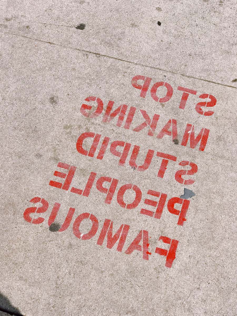 los angeles stop making stupid people famous signage quote